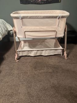 Baby pink bassinet