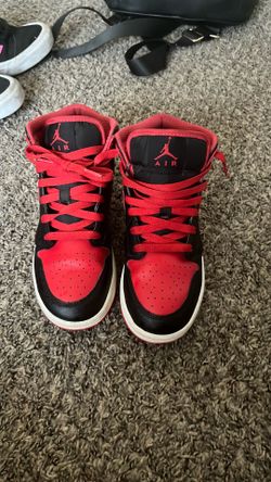 Black and red Jordan 1s