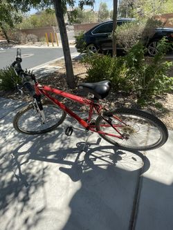 Red 10 Spd. Schwinn Bike & Blue Cliensy Trike.