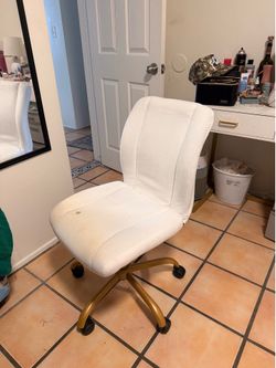 White office chair gold base