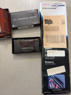 Assortment of old cameras radio and other items
