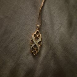 / Necklaces / 10K Gold
10K Rose Gold Plated Opal Celtic Knot Pendant Necklace
