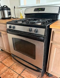 FREE GE® 30" Free-Standing Gas Range Dimensions: 46 1/8 H x 30 W x 26 1/4 D