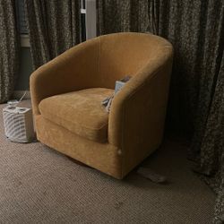 yellow revolving chair 