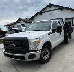 2014 F250 FLEX FUEL AND 16FT TRAILER