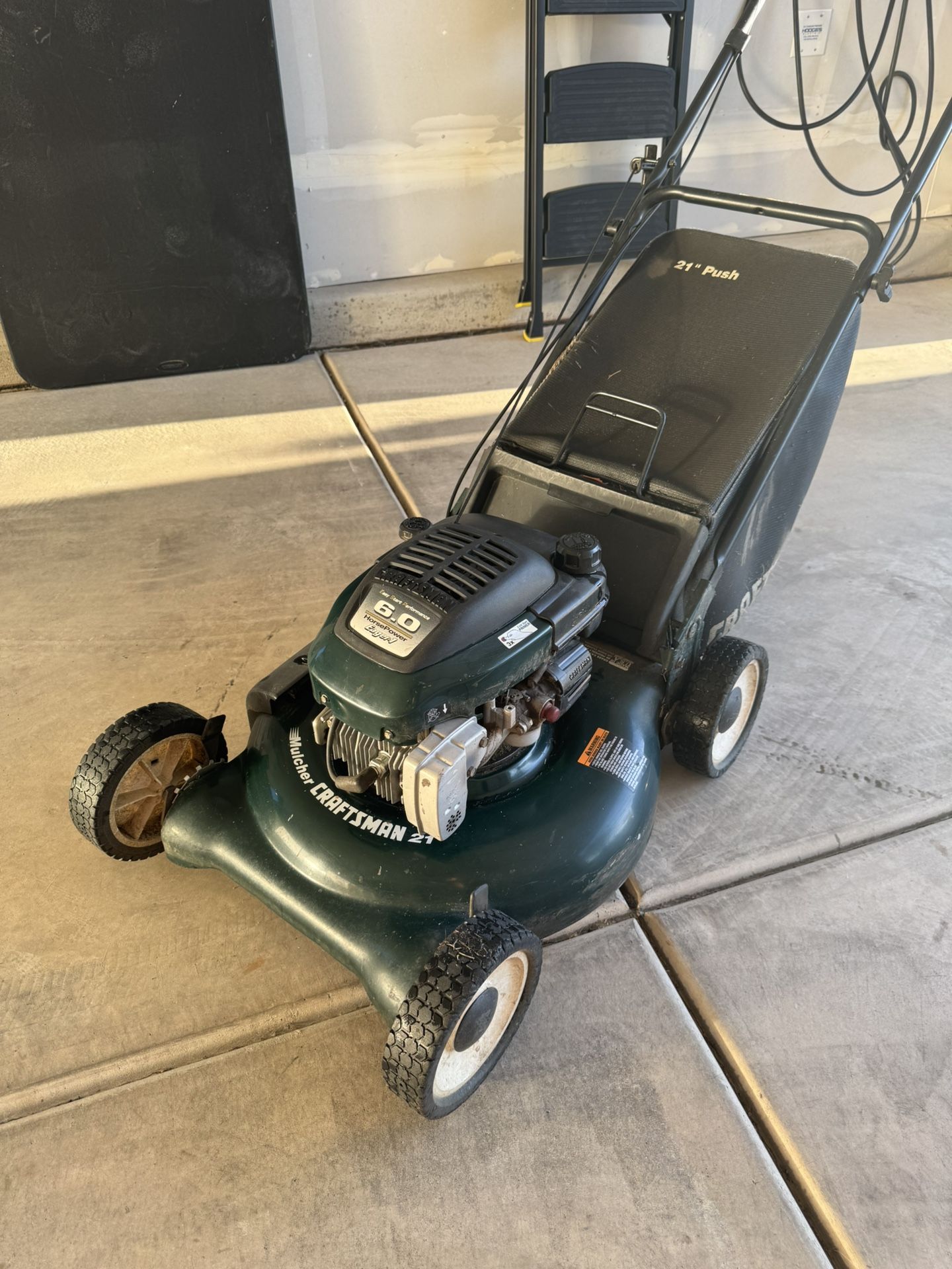 21” Craftsman Push Mulcher model with a horsepower Briggs