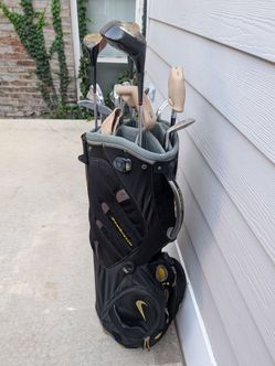 Golf clubs with Nike bag