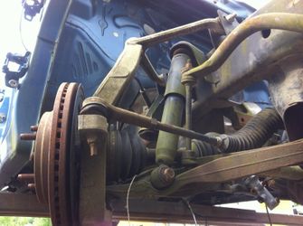 Passenger side complete knuckle assembly