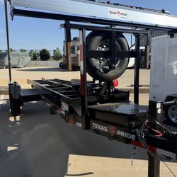 Roll Off Trailer And 3 Dumpsters