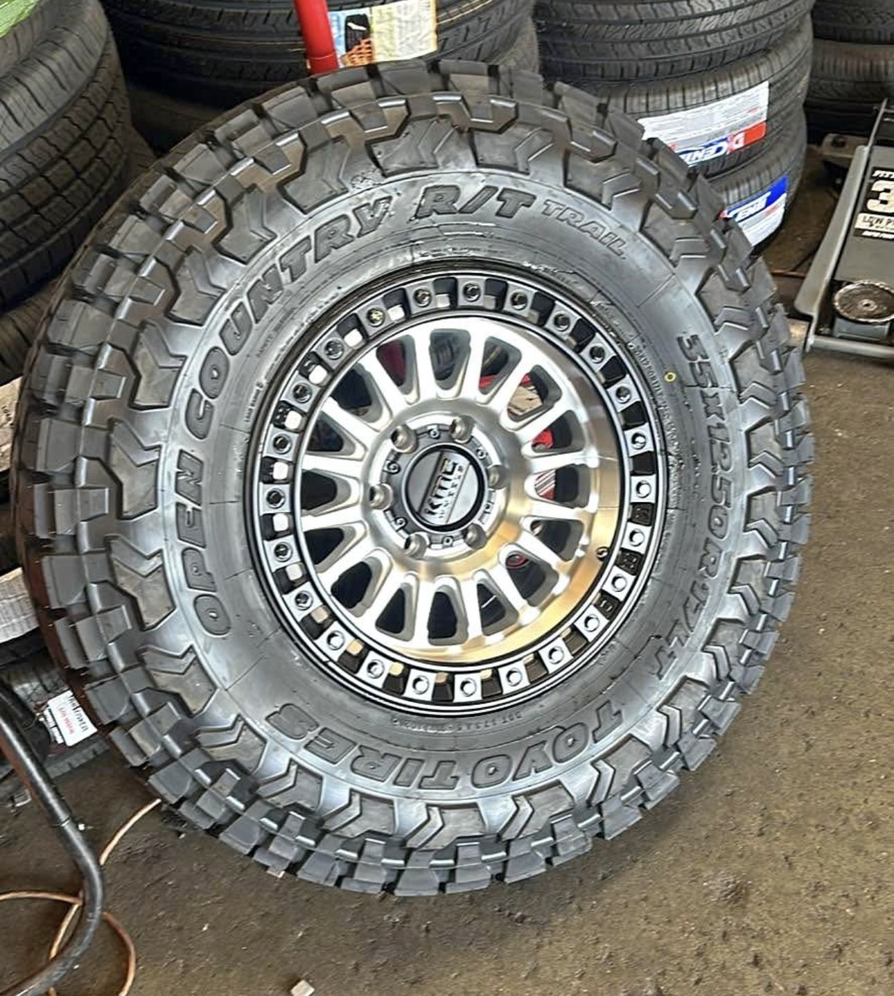 KMC KM552 IMS 17x8.5 6x139.7 -10 Rims 35x12.50R17 Toyo R/T Trail Silverado Sierra Ram 1500 Tundra
