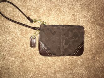 New brown Coach wristlet