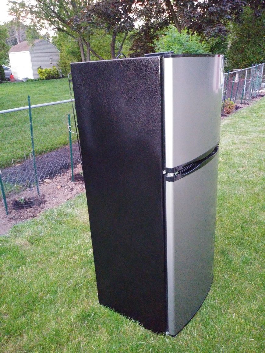 Stainless steel Whirlpool refrigerator 24× 65