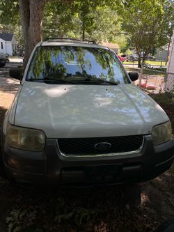 2003 ford escape cot