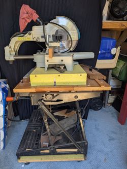 Makita LS101110" slide compound miter saw on Work Mate 400 table
