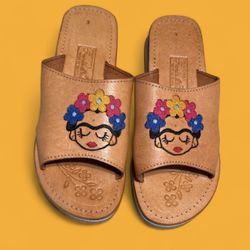 Tan Mexican leather sandals with a Frida Kahlo-inspired