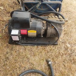 2 HP BALDOR INDUSTRIAL MOTOR  WITH A LEGACY 32 GPM 2000 PSI PUMP.