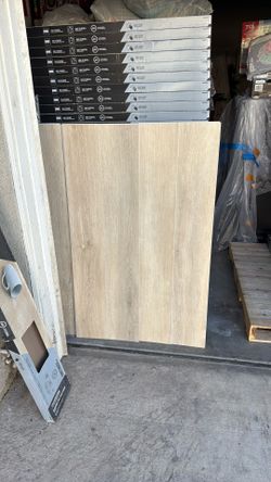 STAINMASTER Austen Oak 12-mil x 7-3/32-in W x 47-in L Waterproof Luxury Vinyl Plank Flooring