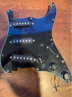 Guitar pick guard loaded