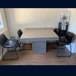 
Cement/ Concrete Dining Table (Gray) + 4 Leather Chairs (Black)