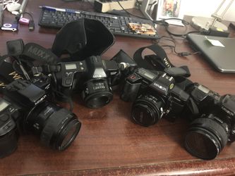 4 cameras all 35 MM film Minolta Maxxum various models