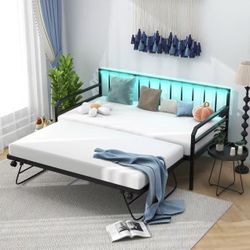 Twin Daybed with Pop Up Trundle, Metal Sofa Bed with Charging Station & LED Lights $200