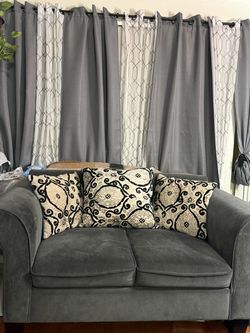Two grey couches