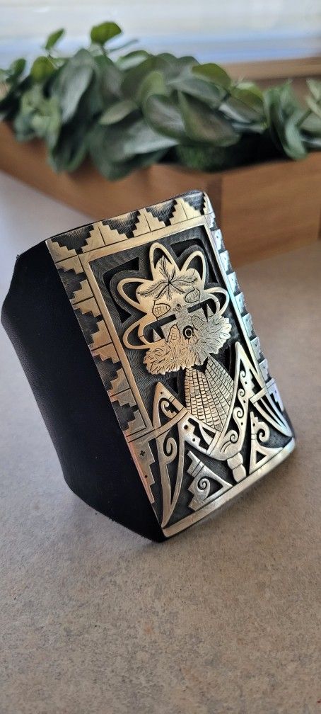 Signed overlay bow guard by Hopi artist Milson Taylor -sterling