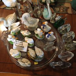 Bone china and crystal ducks and swan figurines. Five dollars each