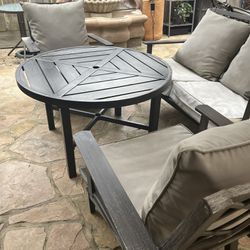 Outdoor Couch, Two Side Chairs and Round Table