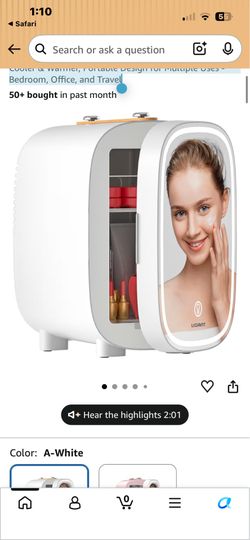 New compact mini refrigerator. Holds 12 cans with mirror and lights. Great for beauty supplies also