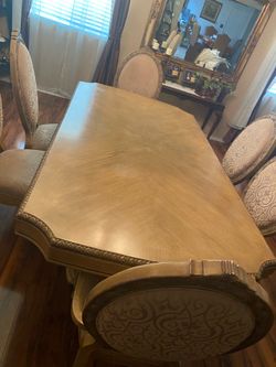 wooden table with 6 chairs