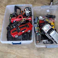two Bins Of Remote Control, Cars, And Additional Parts Not Tested