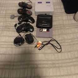 G 16 bit SNES and G minigen sega with controllers and 1 game
