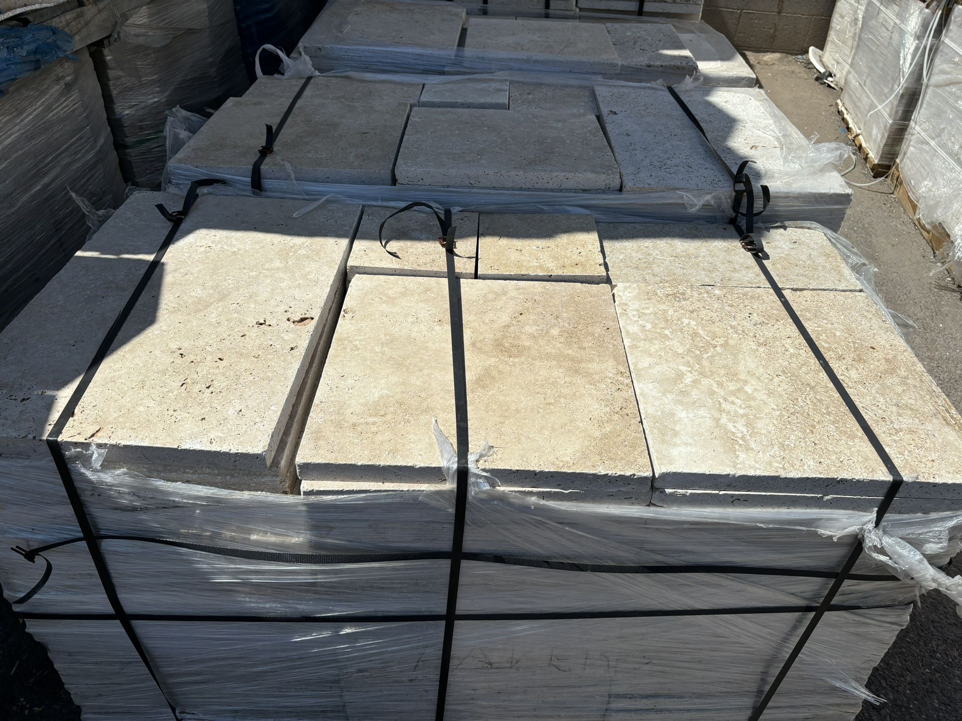 CREAM 4 PIECE TRAVERTINE PAVERS SELLING BELOW WHOLESALE.
