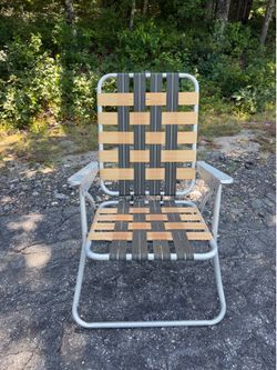 Vintage webbed aluminum folding lawn chair