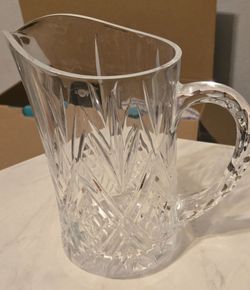 Hand carved lead glass pitcher