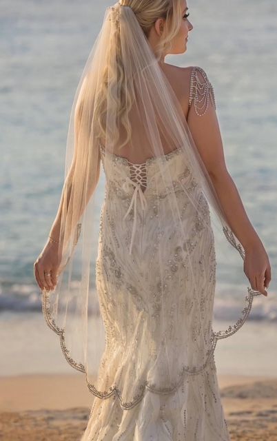 Vintage hand stitched, with jewels, long wedding veil. Designer Enaura