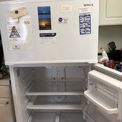 Winia top-freezer refrigerator in a white finish.