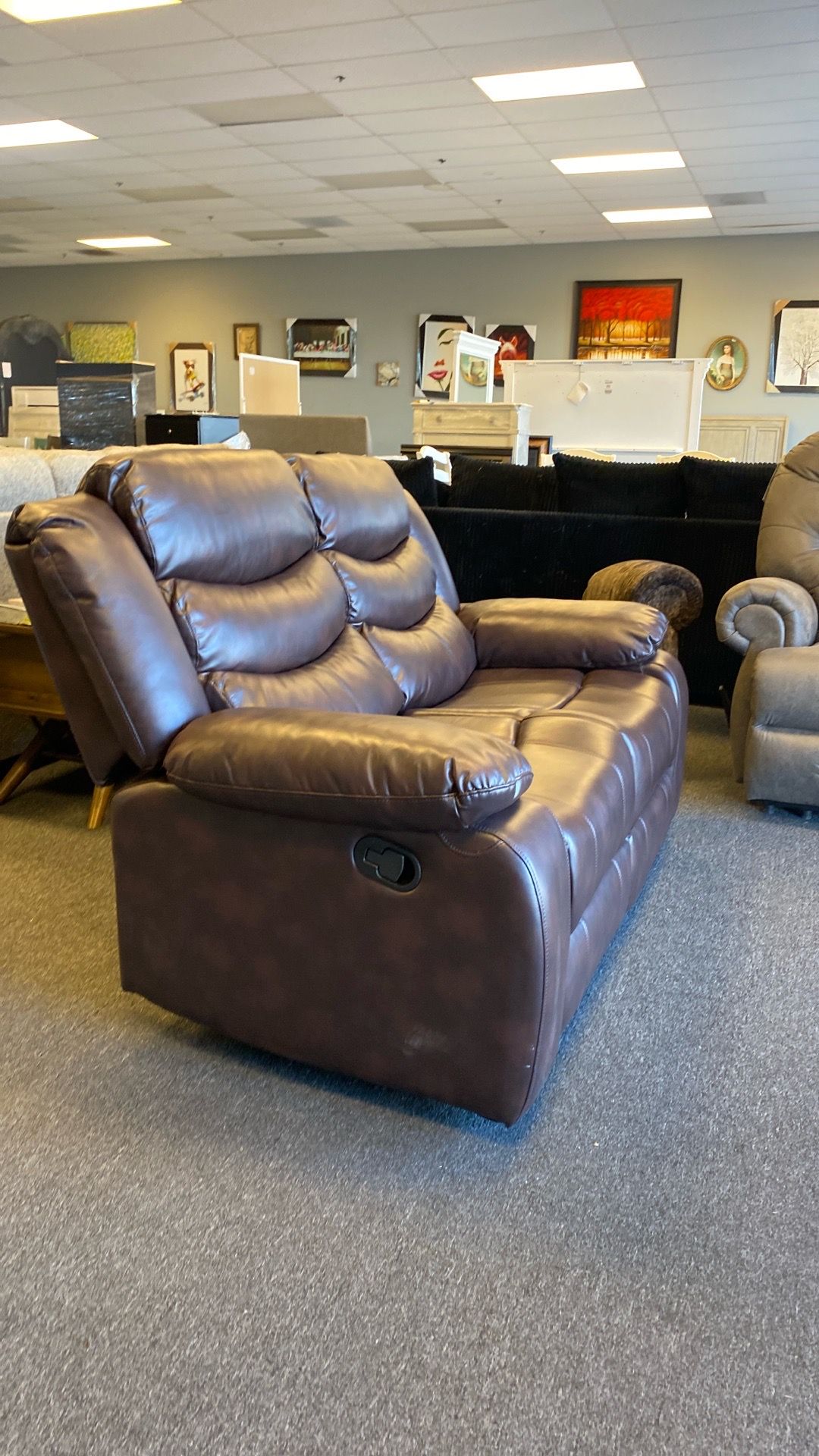 Loveseat leatherette new brown manual was $899 now $390. Can deliver very comfy and new