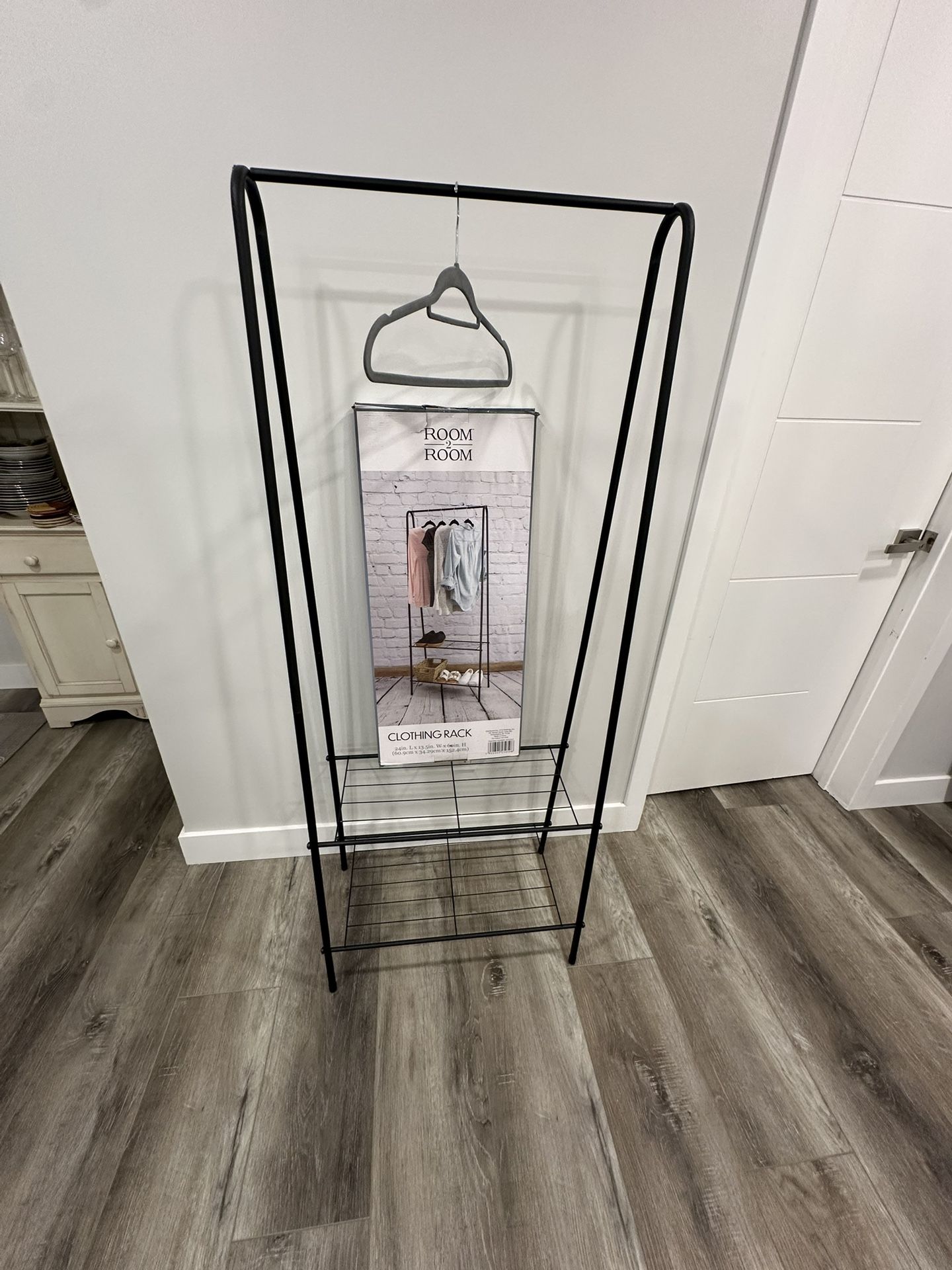 Clothes hanger with two shelves