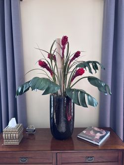 Vase with 2 bamboo stalks and ginger flowers