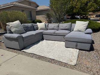 Large gray couch with storage