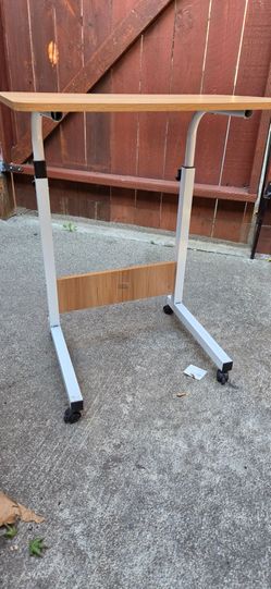 Adjustable side table with wheels