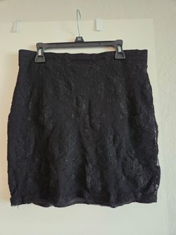 Black lace mini skirt