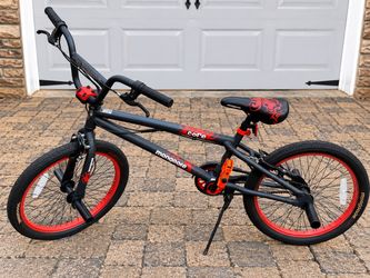 Mongoose Core 20in BMX Bike – w/ Gyro,  front and back Pegs, Orange Accents