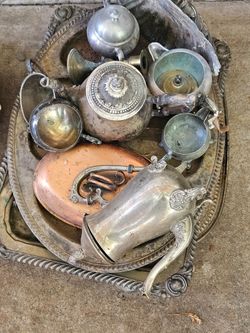 Silver platters and cast iron