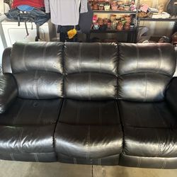 Black Reclining Sectional Sofa w/ Console & Cupholders