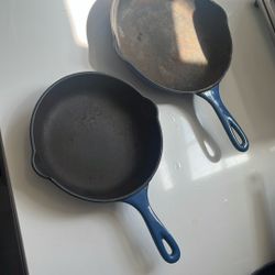 Two Blue Le Creuset Cast Iron Pans 