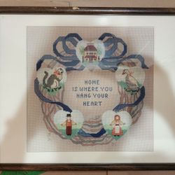 17×21 needle stitch in laminate wood frame