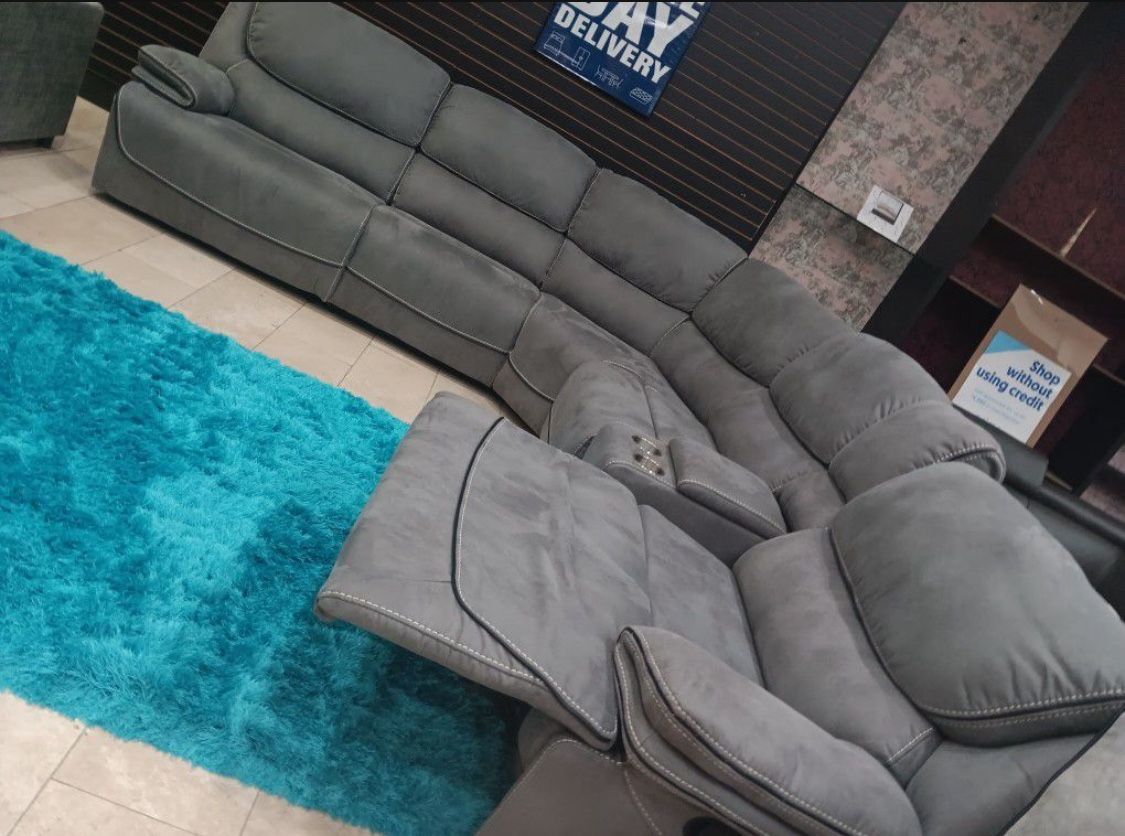 Black Friday sale now. Alejandra gray reclining sectional only $1799. Easy finance option. Same day delivery.